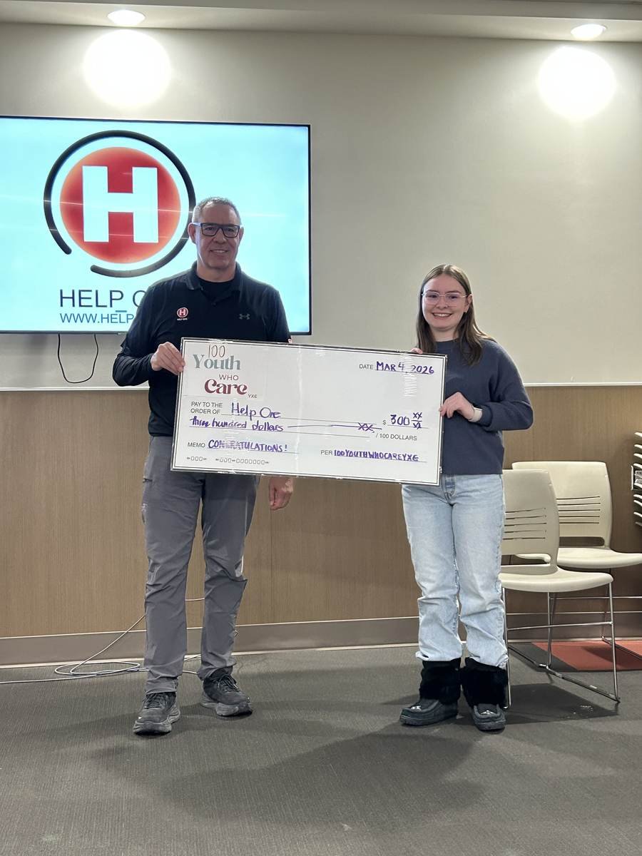 Cheque presentation to Help One