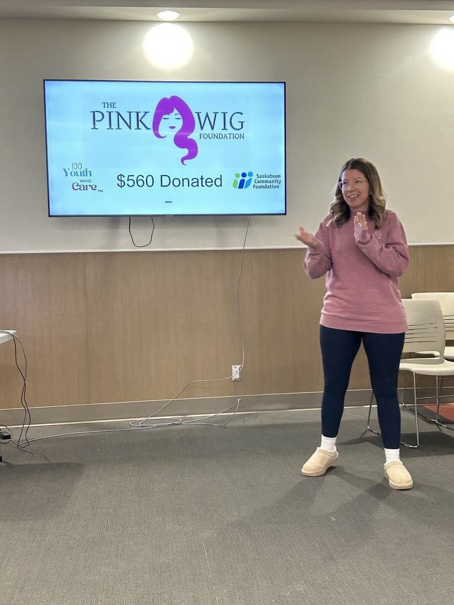 Presenter sharing how the $560 donation was used